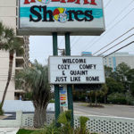 exterior sign for Holiday Shores