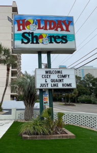 exterior sign for Holiday Shores
