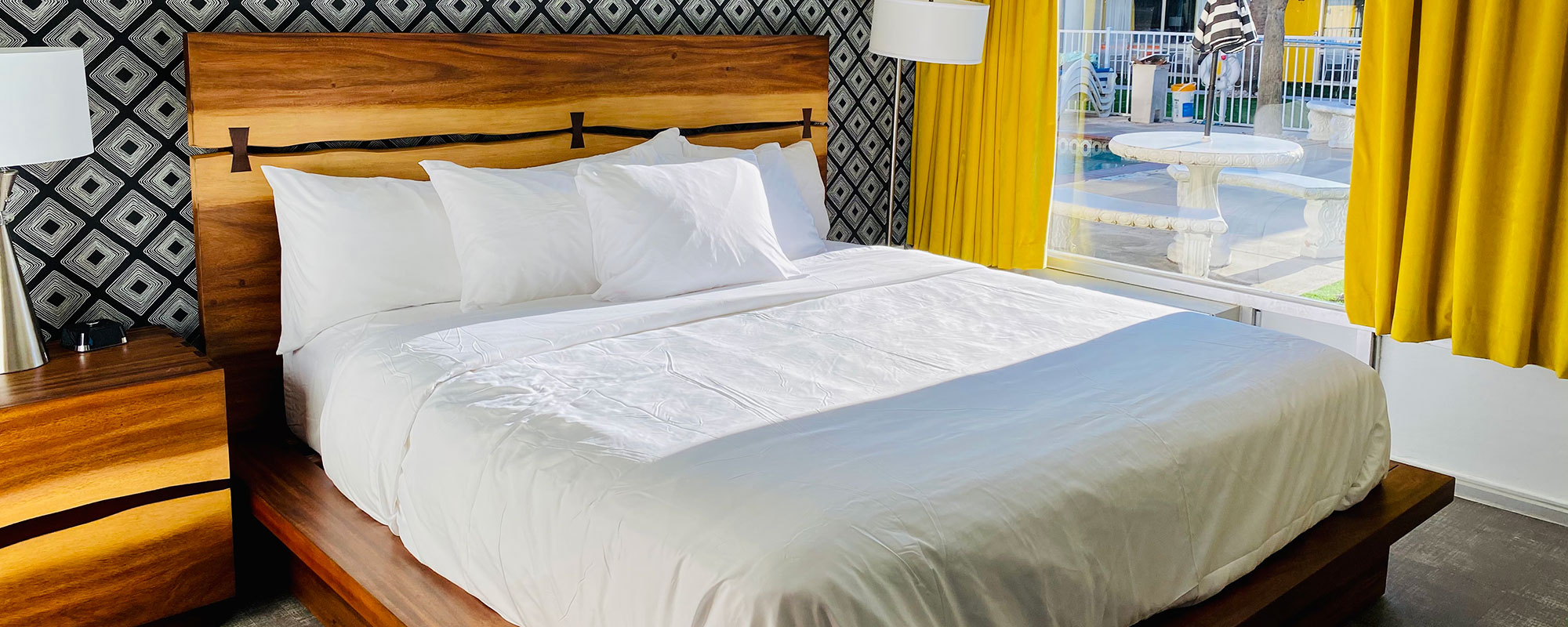 one king bed guest room with pool view